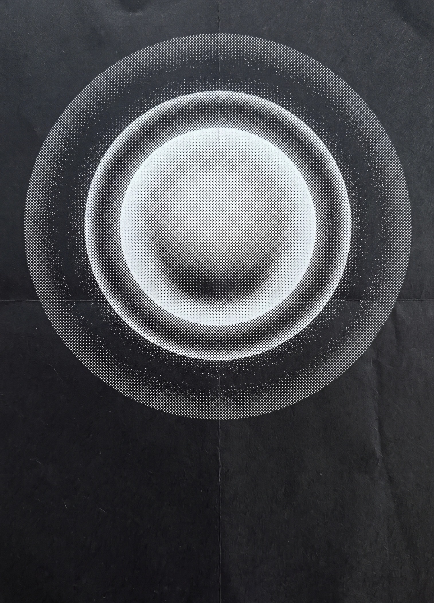 Glowing concentric rings on a dark, textured poster
