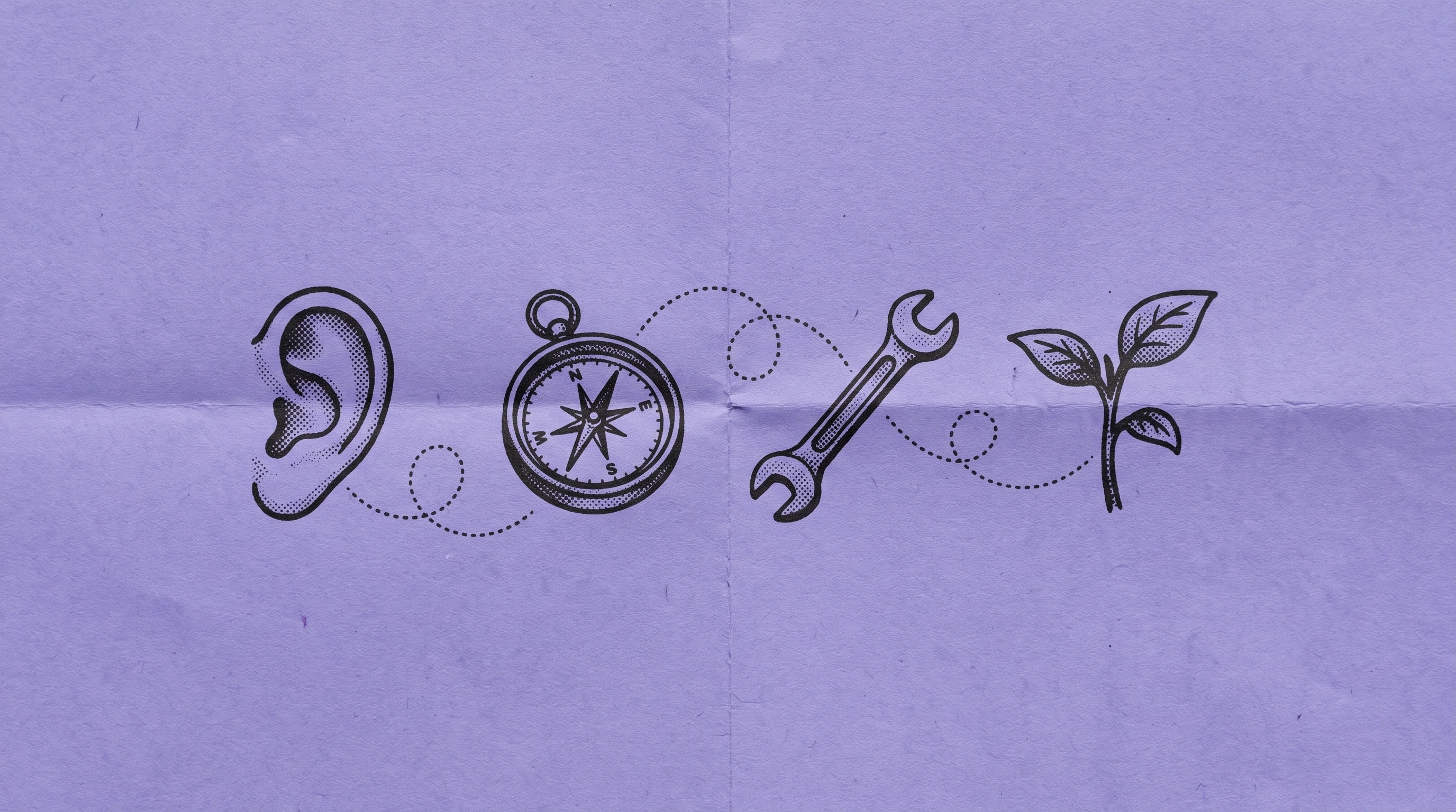 An ear, a compass, a wrench and a seedling drawn on purple paper